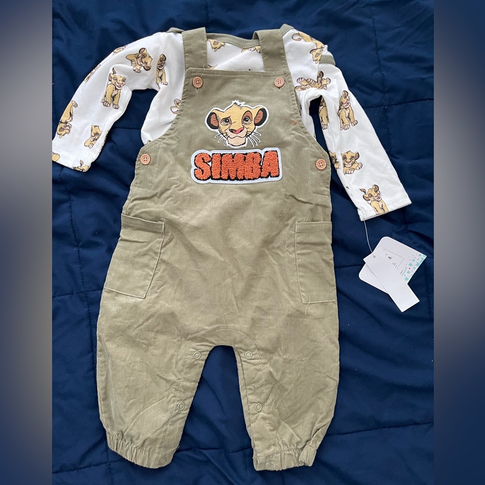Lion king jumper/overall. Never worn to small.. Snaps easy for diaper change